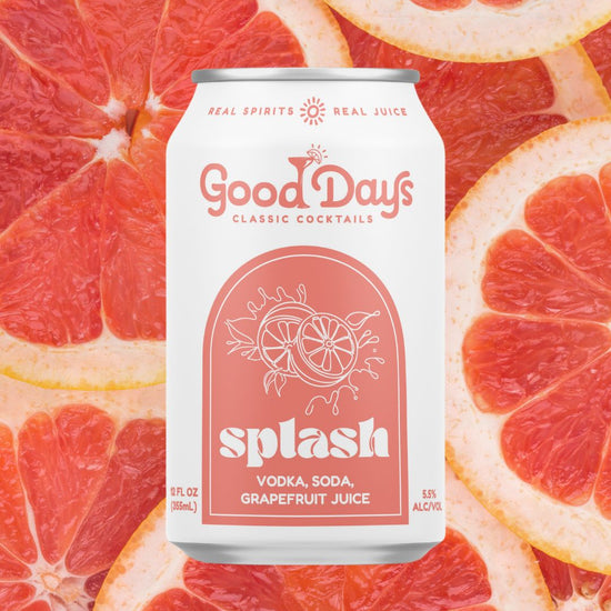 Can of 'Good Days Splash' cocktail on a background of grapefruit slices